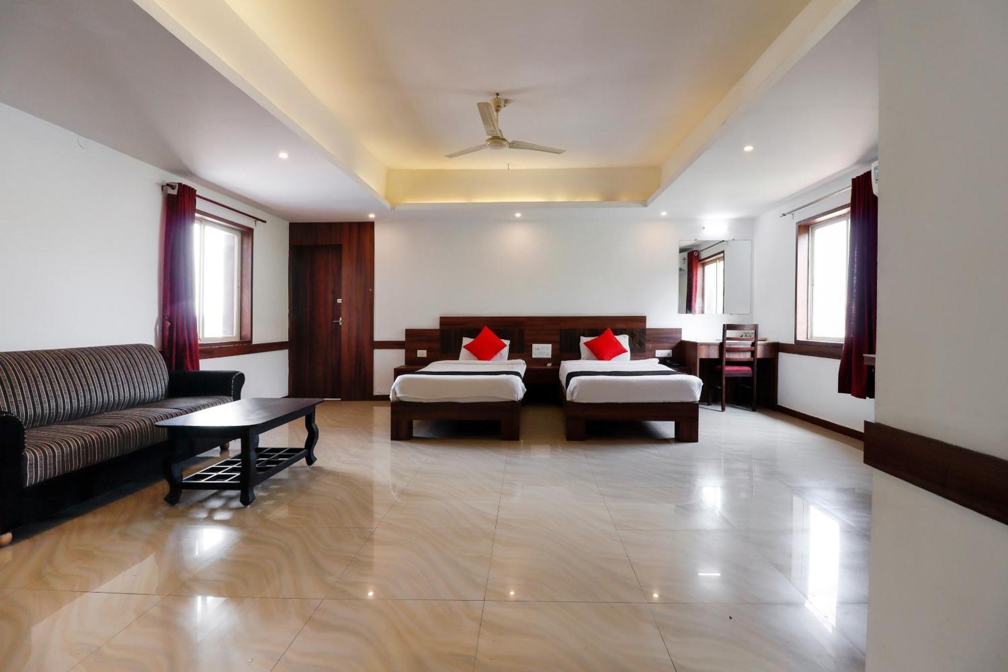 Capital O Sai Arya Residency Hotel