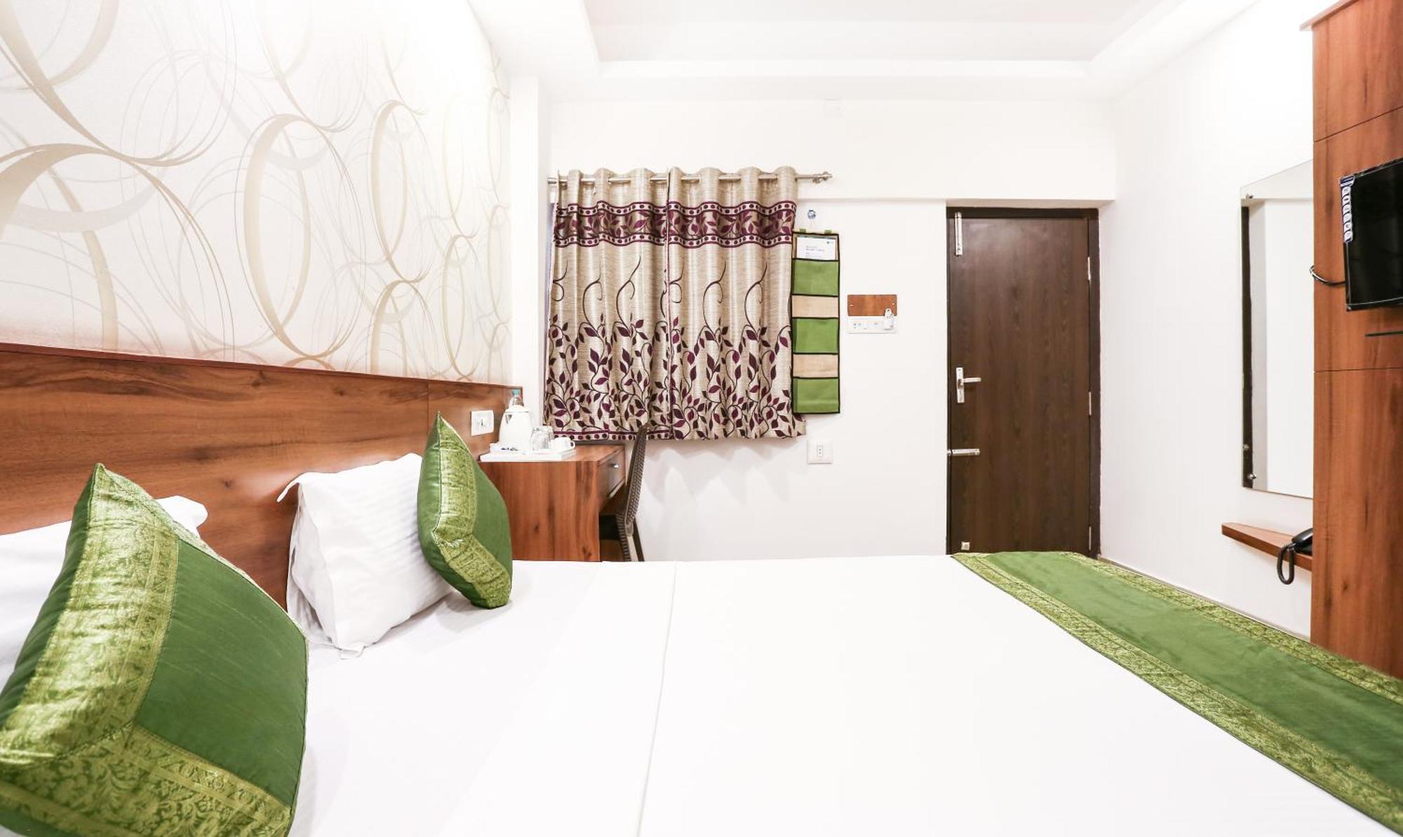 Treebo Comforts Inn, Road Deralakatte Hotel