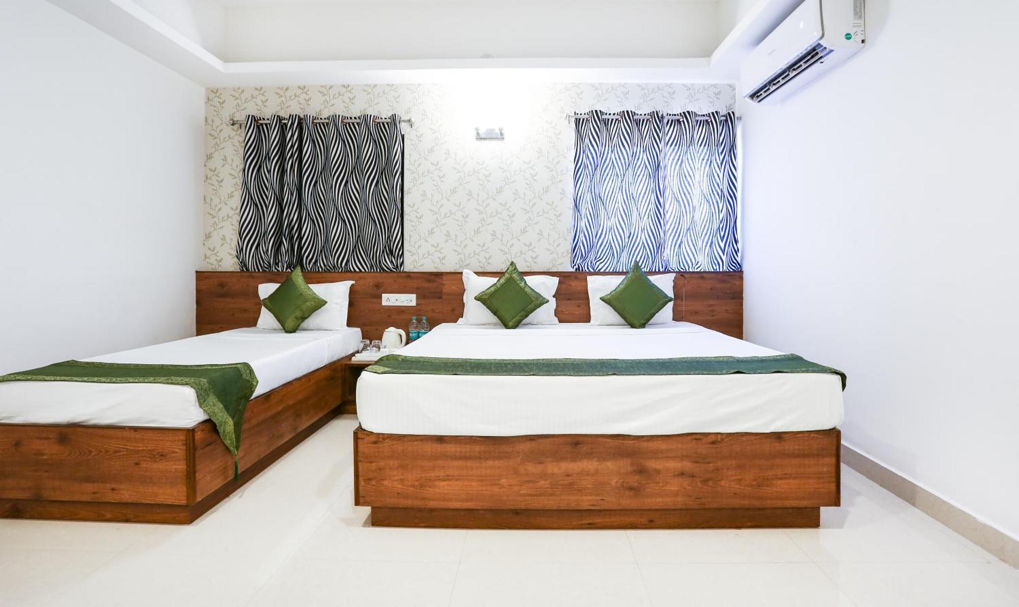 Treebo Comforts Inn, Road Deralakatte Hotel