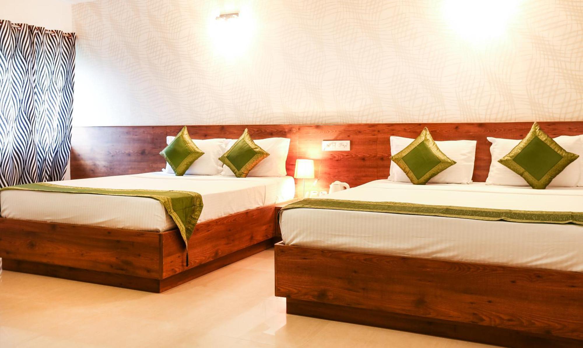 Treebo Comforts Inn, Road Deralakatte Hotel Mangalore