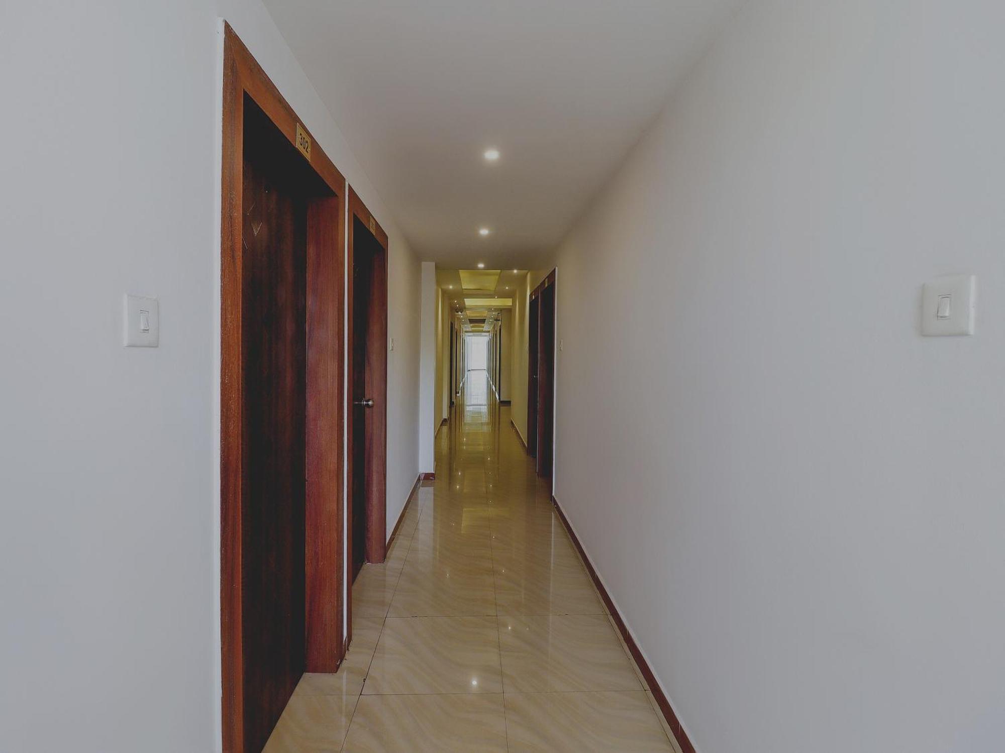 Hotel Capital O Sai Arya Residency Mangalore